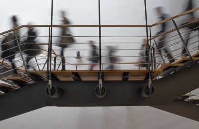 Image people walking down flight of stairs