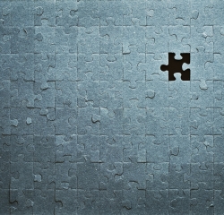 Puzzle with one piece missing