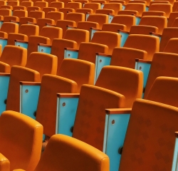 Rows of collapsible theatre chairs